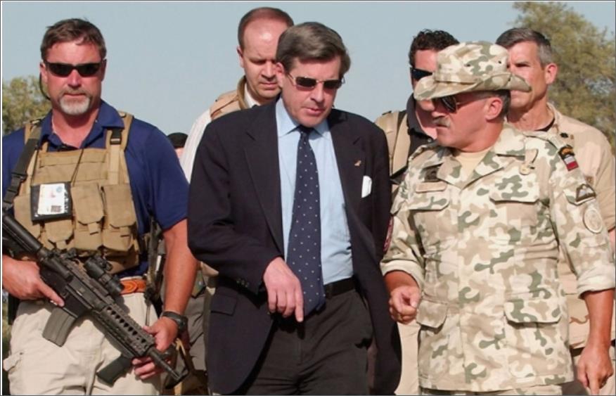The head of the US administration in Iraq, Paul Bremer, and his guards from Blackwater