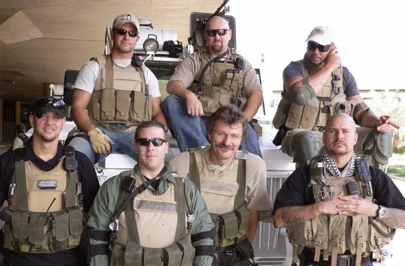 Employees of Blackwater in Iraq poses for the camera in an informal atmosphere