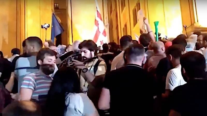 In Georgia, protesters smashed the office of the ruling party