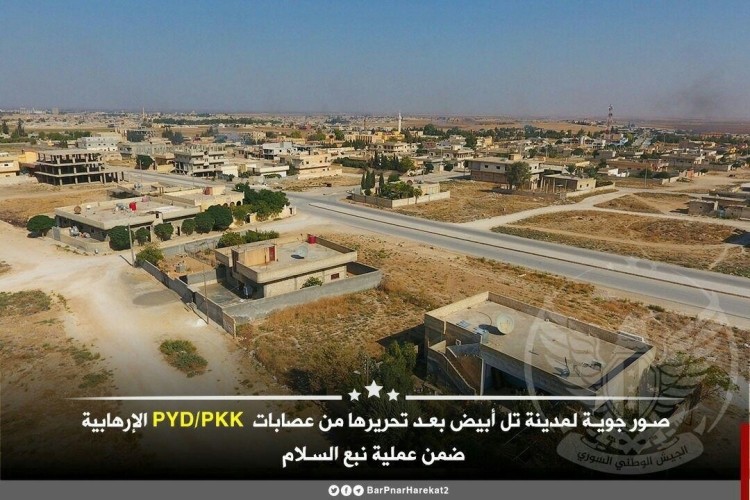Pro-Turkish forces shown in the photo of Tel Abyad, freed from Kurdish terrorists