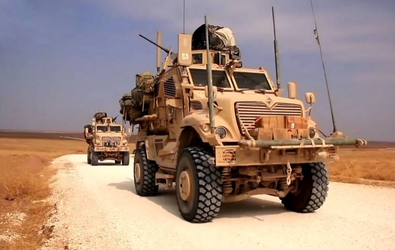 US armored vehicles pull together the richest oil fields in Syria