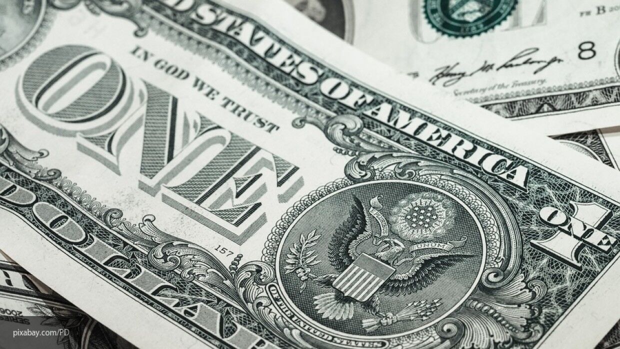 Центробанк понизил официальный курс доллара