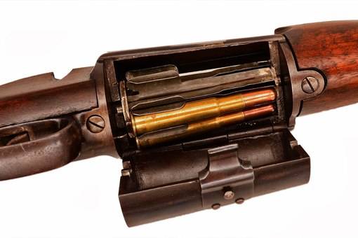 historia de las armas: Rifle salvaje con cargador giratorio 