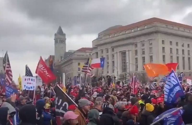 Trump supporters burst into Capitol building, surrounding the Senate Hall